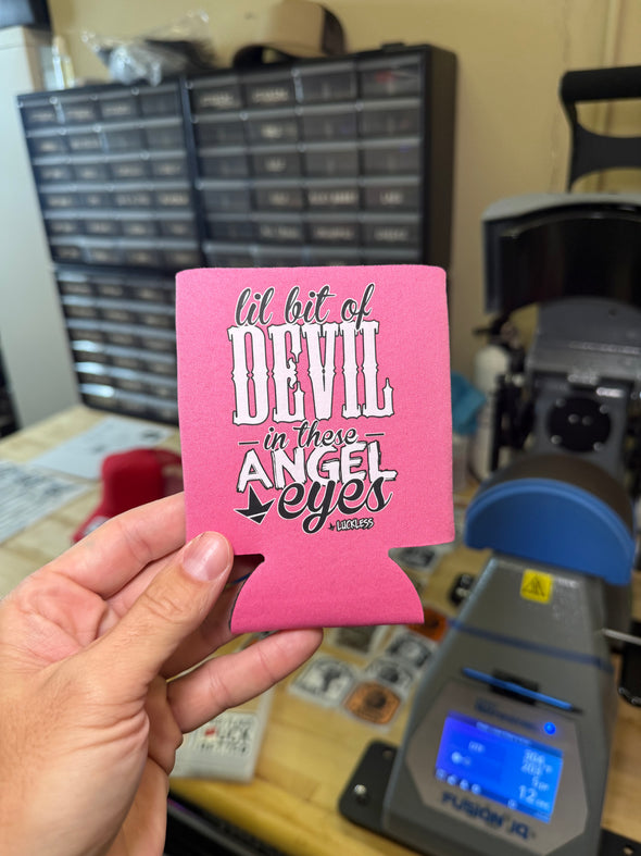 Lil Bit Of Devil in these Angel Eyes Koozie Luckless Outfitters
